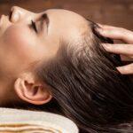 masseur doing massage head hair woman spa salon 1